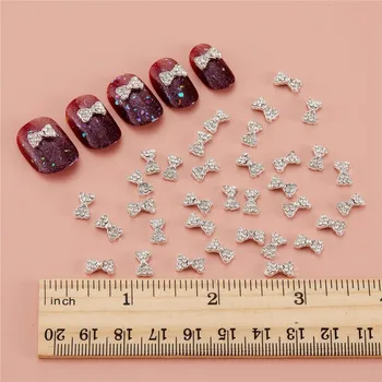 1000 Adet Metal Alaşım Rhinestone 3D Yaylar Tırnak Takılar Kristal Taşlar Şerit Yay tırnak mücevheri AB Rhinestone Charm Tırnak Sanat Dekorasyon